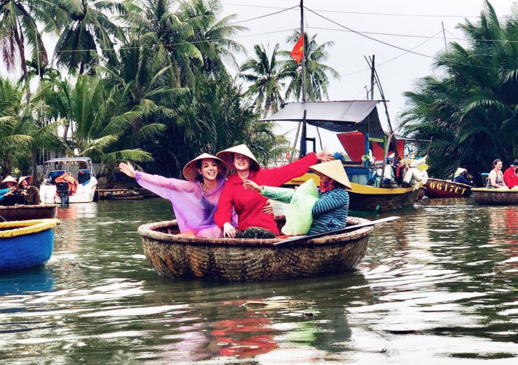 volunteering in vietnam riding a boat with friends